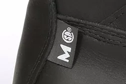 Badge that indicates metatarsal protection work boot feature as specified by CSA.